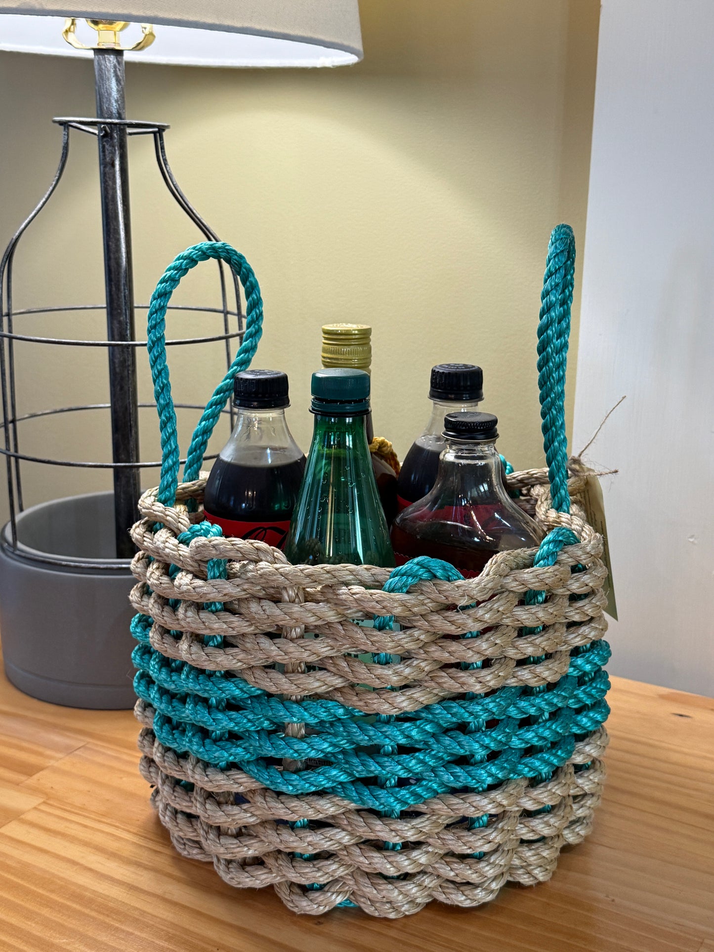 Tan and Green Rope Basket filled with Beverages