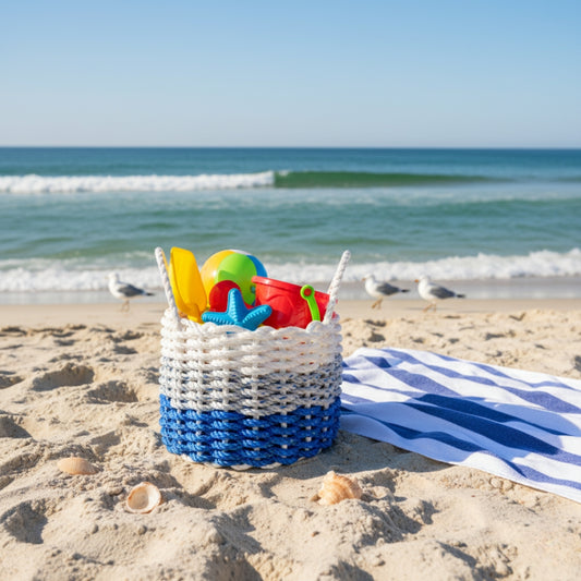 Blue Gray and White Striped Lobster Rope Basket on the beach filled with beach toys
