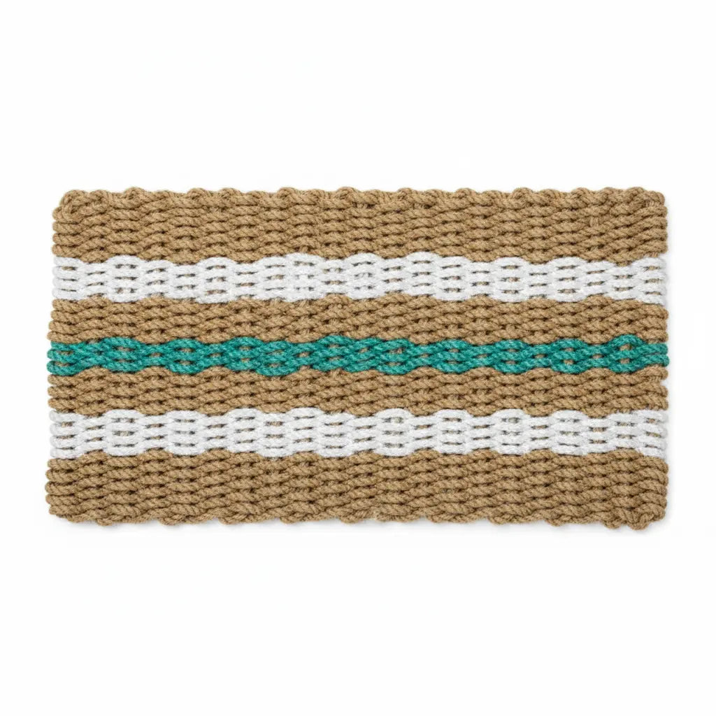Woven doormat with striped pattern on a white background