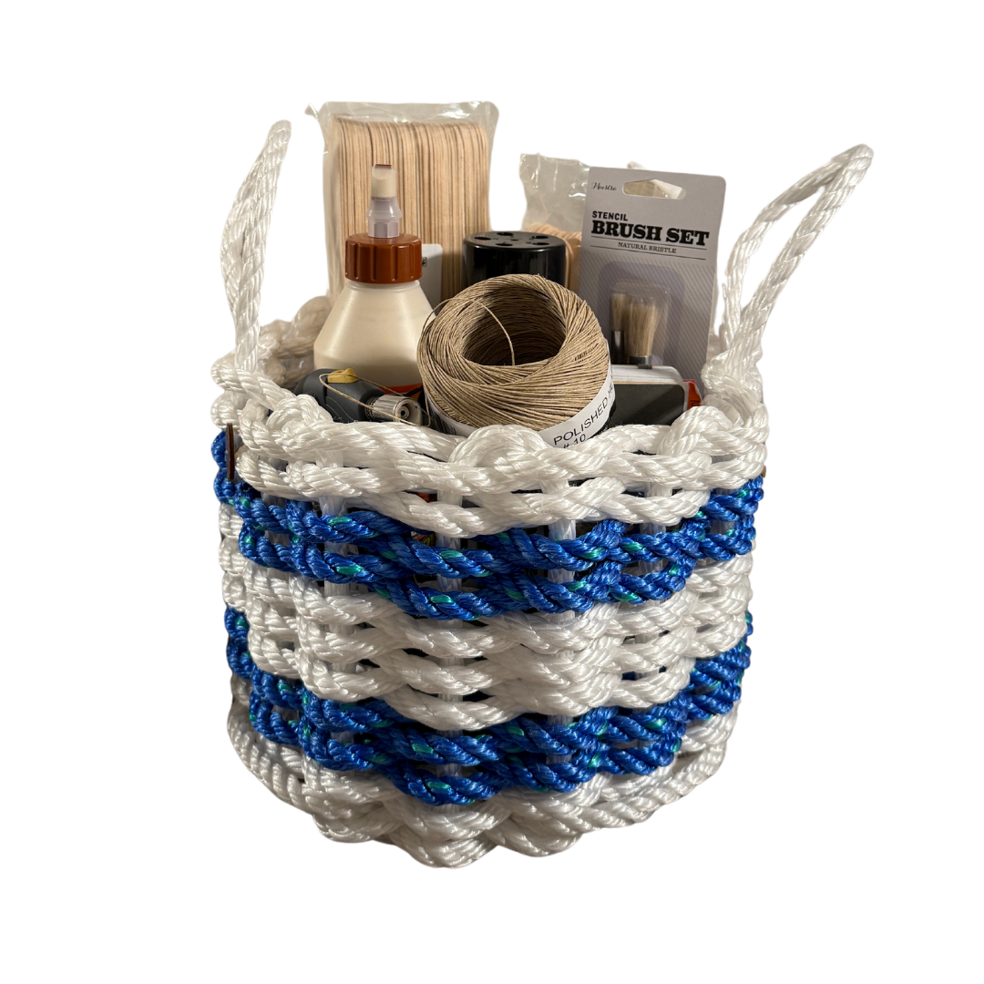 White and Blue Rope Basket Filled with Craft Items