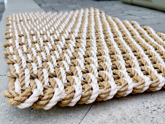 Close-up of the textured tan and sand double weave rope pattern.