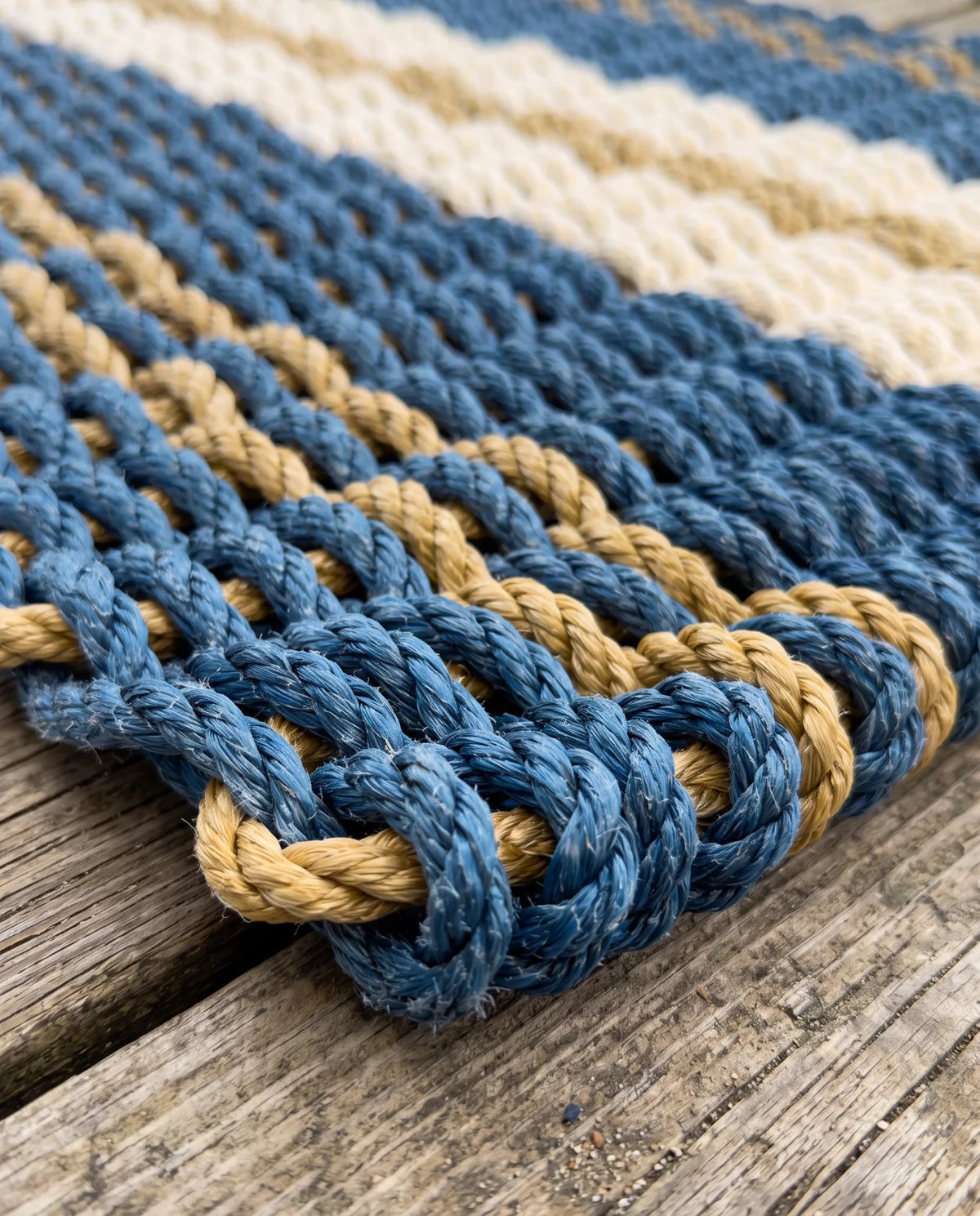 Close-up of The Admiral's woven rope texture and blue, tan and sand pattern.