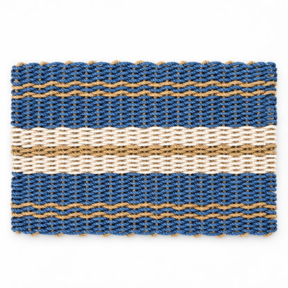 The Admiral blue, tan and sand lobster rope doormat with its distinctive center band and stripe pattern.
